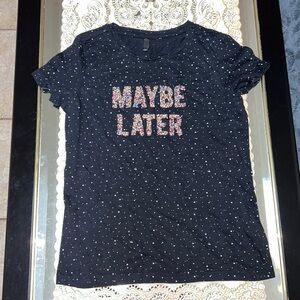 Black graphic t-shirt with white dots